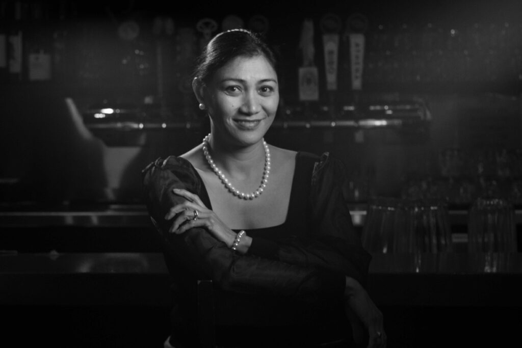 woman, bar side at Blue Tick Cafe