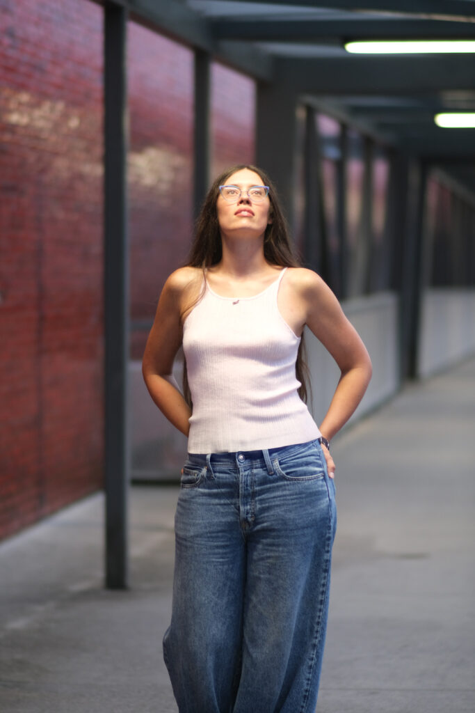 Woman on pedestrian bridge in Downtown Knoxville